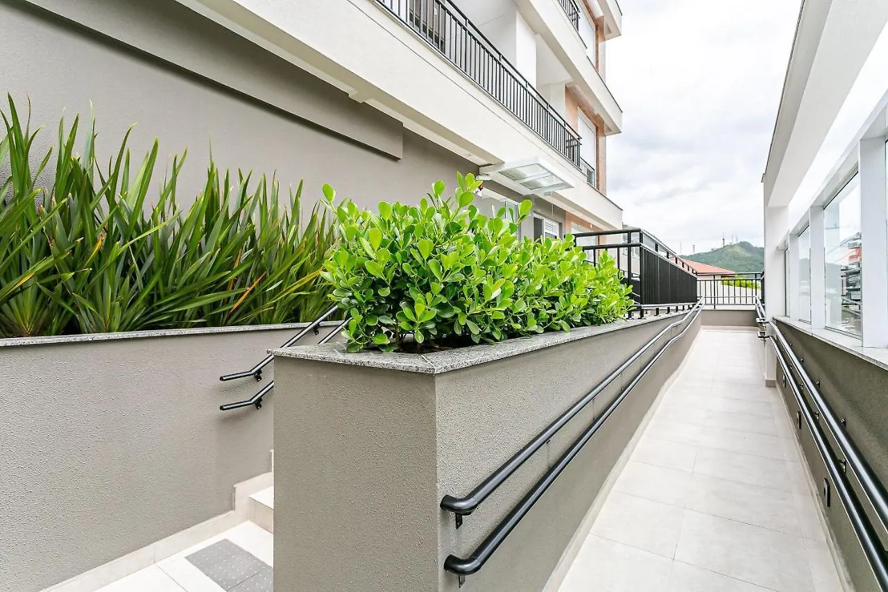 Apartamento próximo à UFSC com estacionamento e rooftop Florianópolis